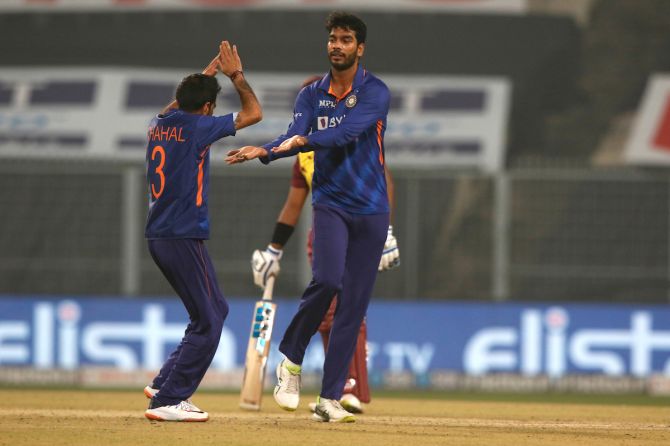 Venkatesh Iyer celebrates with Yuzvendra Chahal agter dismissing Jason Holder.