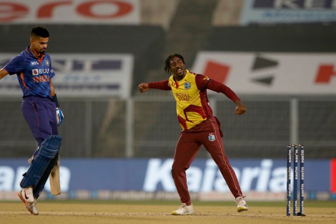 West Indies spinner Hayden Walsh Jr celebrates the wicket of Shreyas Iyer.