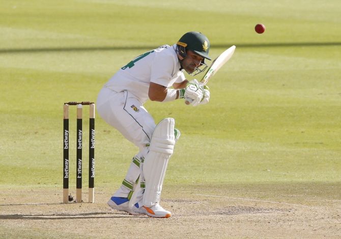 Opener Dean Elgar takes evasive action against a bouncer during South Africa's second innings on Day 3 of the second Test against India, in Johannesburg, on Wednesday.