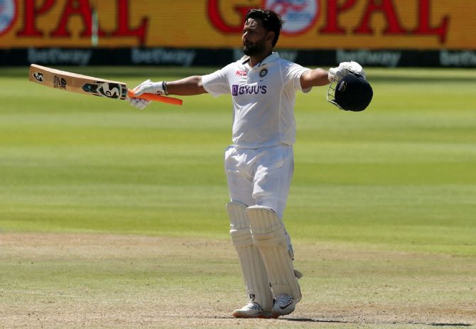 India's Rishabh Pant celebrates after getting to 100 in the second innings on Day 3 of the third Test against South Africa, in Cape Town, on Thursday.