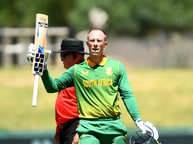 South Africa's Rassie van der Dussen acknowledges the applause from teammates and fans after scoring a century.