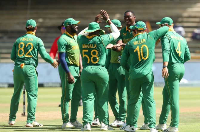 South Africa pacer Lungi Ngidi celebrates with teammates after dismissing India opener K L Rahul.