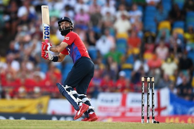 England's Moeen Ali hits a six during the fourth T20 International against the West Indies at Kensington Oval, in Bridgetown, Barbados, on Saturday.