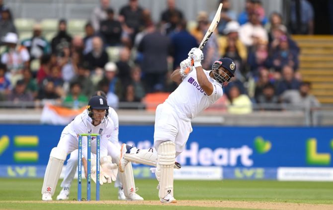 India batsman Rishabh Pant dances down the wicket to hit Jack Leach for a six.