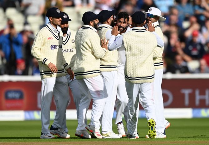 India pacer Mohammed Siraj celebrates with teammates after dismissing England's Joe Root during Day 2 of the fifth Test at Edgbaston, Birmingham, on Saturday.