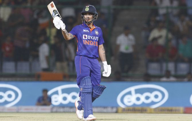 Ishan Kishan of India raises his bat after scoring a fifty
