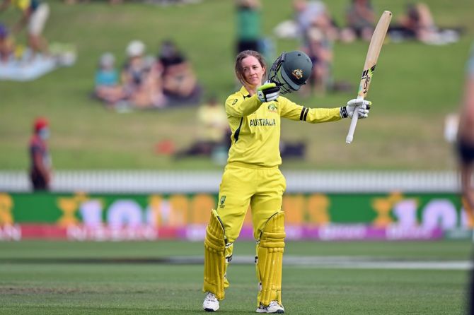 Australia's Rachael Haynes celebrates her century during the 2022 ICC Women's Cricket World Cup match against England, at Seddon Park in Hamilton, New Zealand, on Saturday.