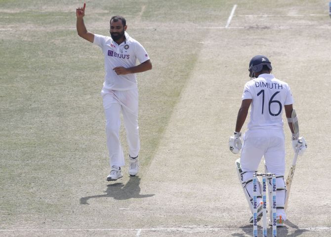 Mohammed Shami celebrates the wicket of Dimuth Karunaratne in Sri Lanka's second innings