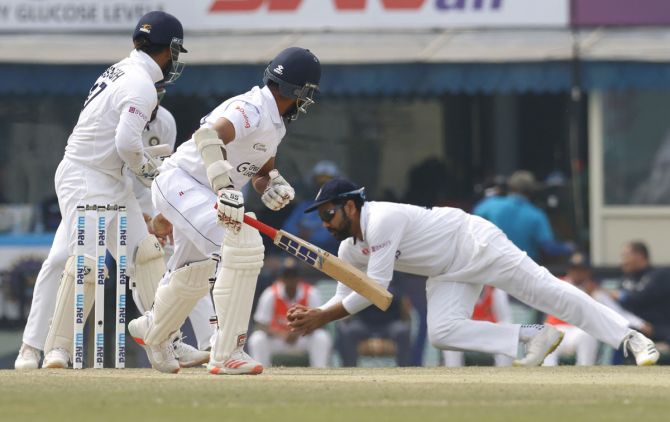 Sri Lanka opener Lahiru Thirimanne is caught by Rohit Sharma off the bowling of Ravichandran Ashwin in the second innings.