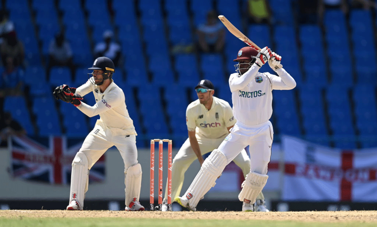 West Indies' Nkrumah Bonner bats while England wicketkeeper Ben Foakes watches