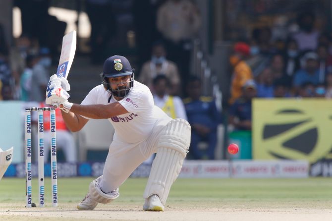 Opener Rohit Sharma sweeps a delivery during India's second innings.