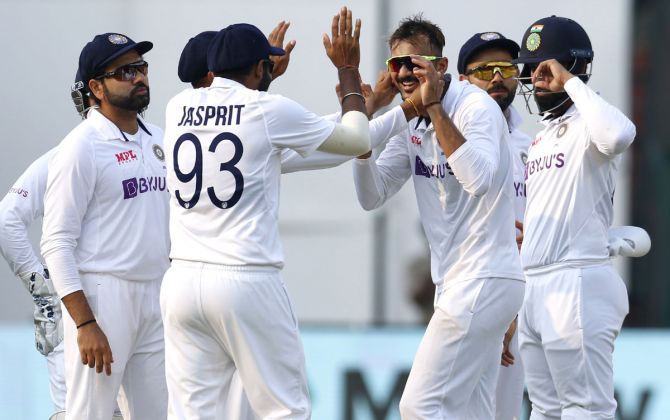 Axar Patel celebrates the wicket of Charith Asalanka.