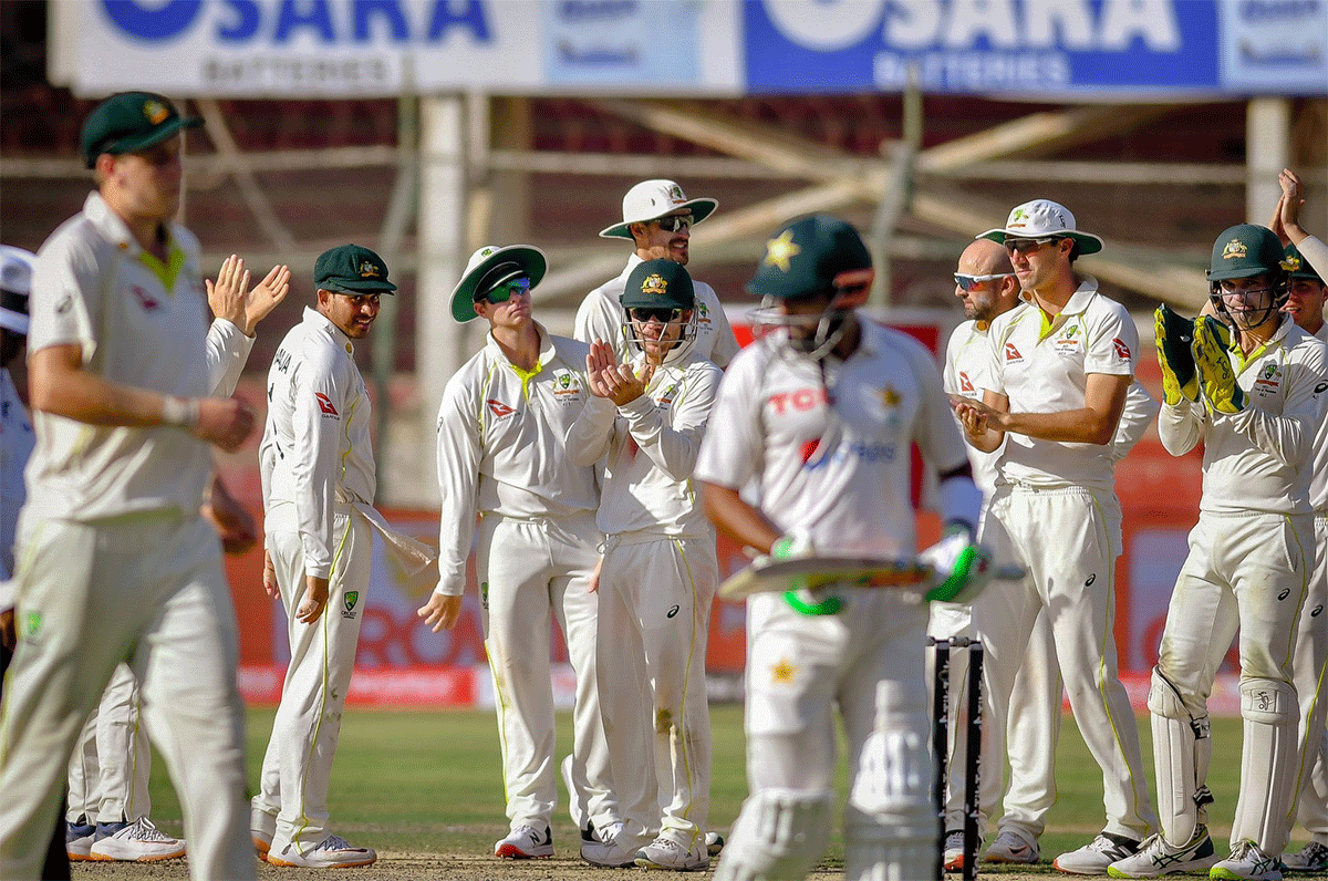 Babar Azam is applauded by Australian cricketers after his match-saving 196 in the 2nd Test in Karachi on Wednesday
