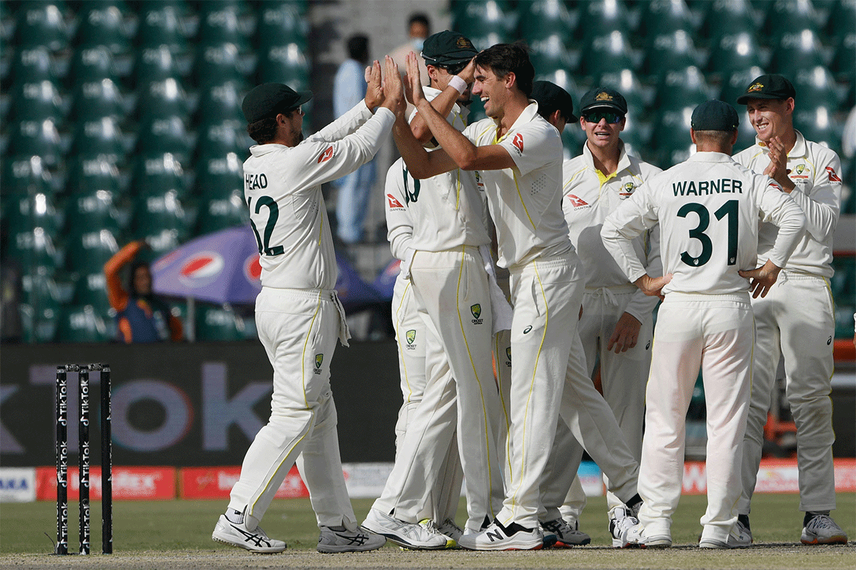 Australia skipper Pat Cummins celebrates a wicket on Day 3 of the third Test against Pakistan in Lahore on Wednesday