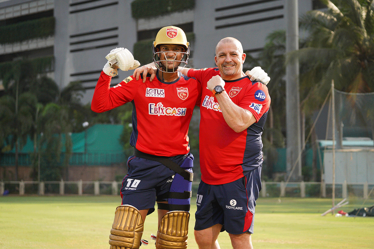 Punjab Kings batting consultant Julian Wood with team captain Mayank Agarwal during a trainging session ahead of the Indian Premier League 2022 in Chandigarh. Wood is in India for his maiden IPL stint with Punjab Kings. 