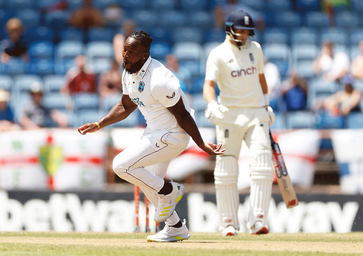 West Indies' Kyle Mayers celebrates after dismissing England's Joe Root for a duck on Day 1 of the 3rd Test at National Cricket Stadium, St George's, Grenada on Thursday