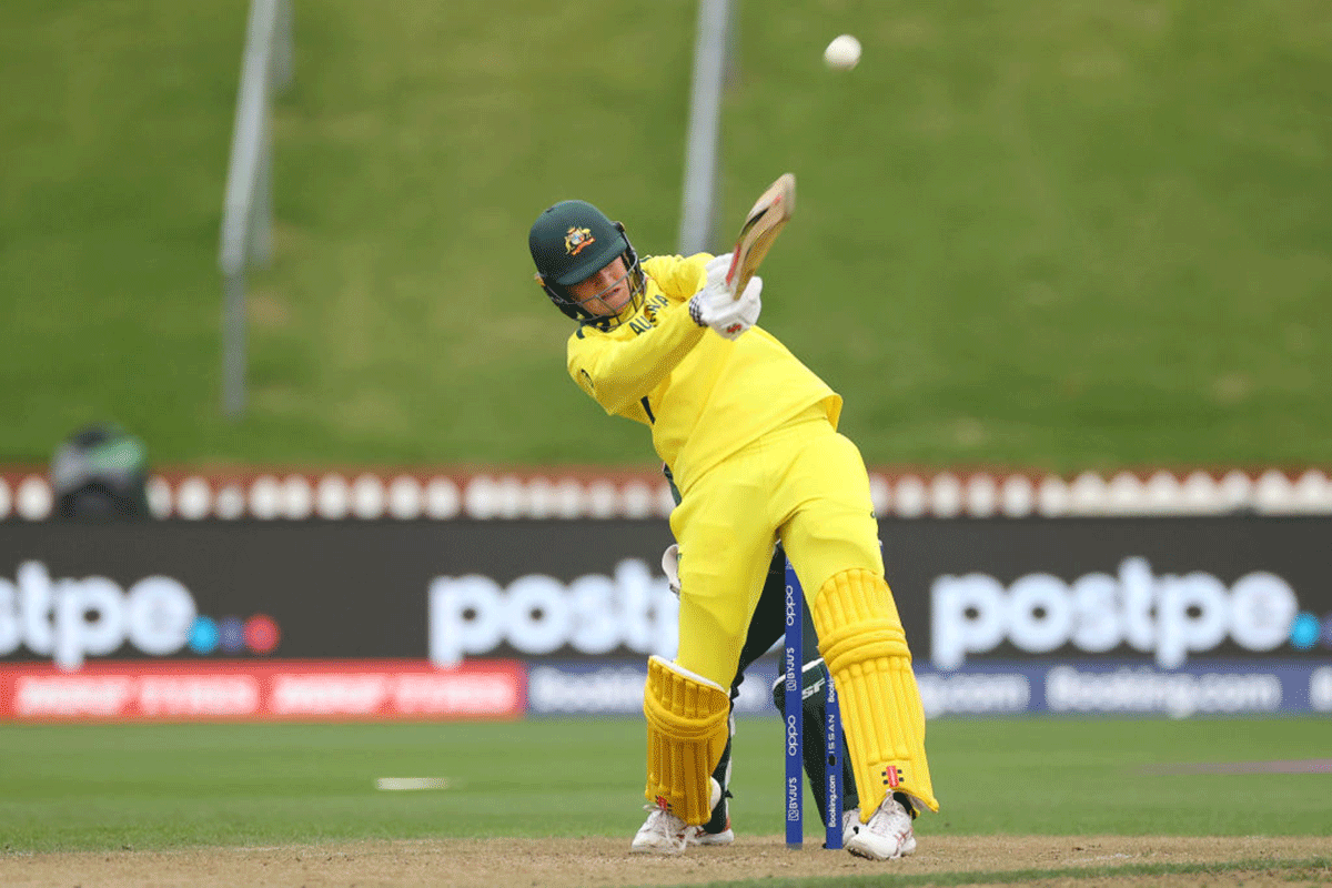 Australia's Beth Mooney hits a four during the 2022 ICC Women's Cricket World Cup match against Bangladesh at Basin Reserve in Wellington, New Zealand, on Friday