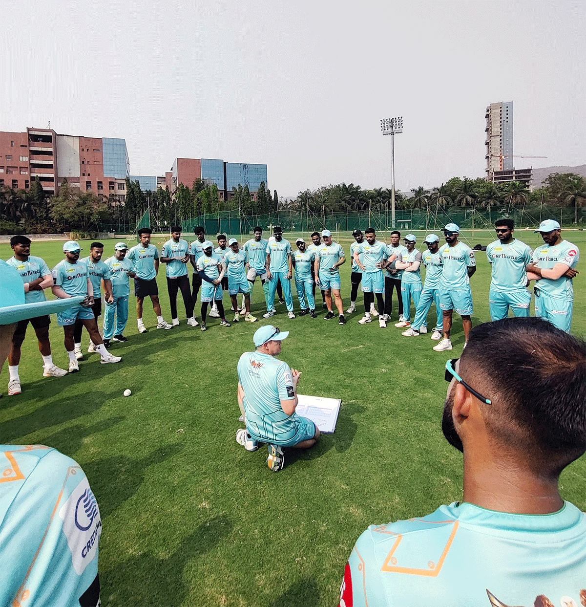 Lucknow Super Giants' coach Andrew Flower speaks to players during training