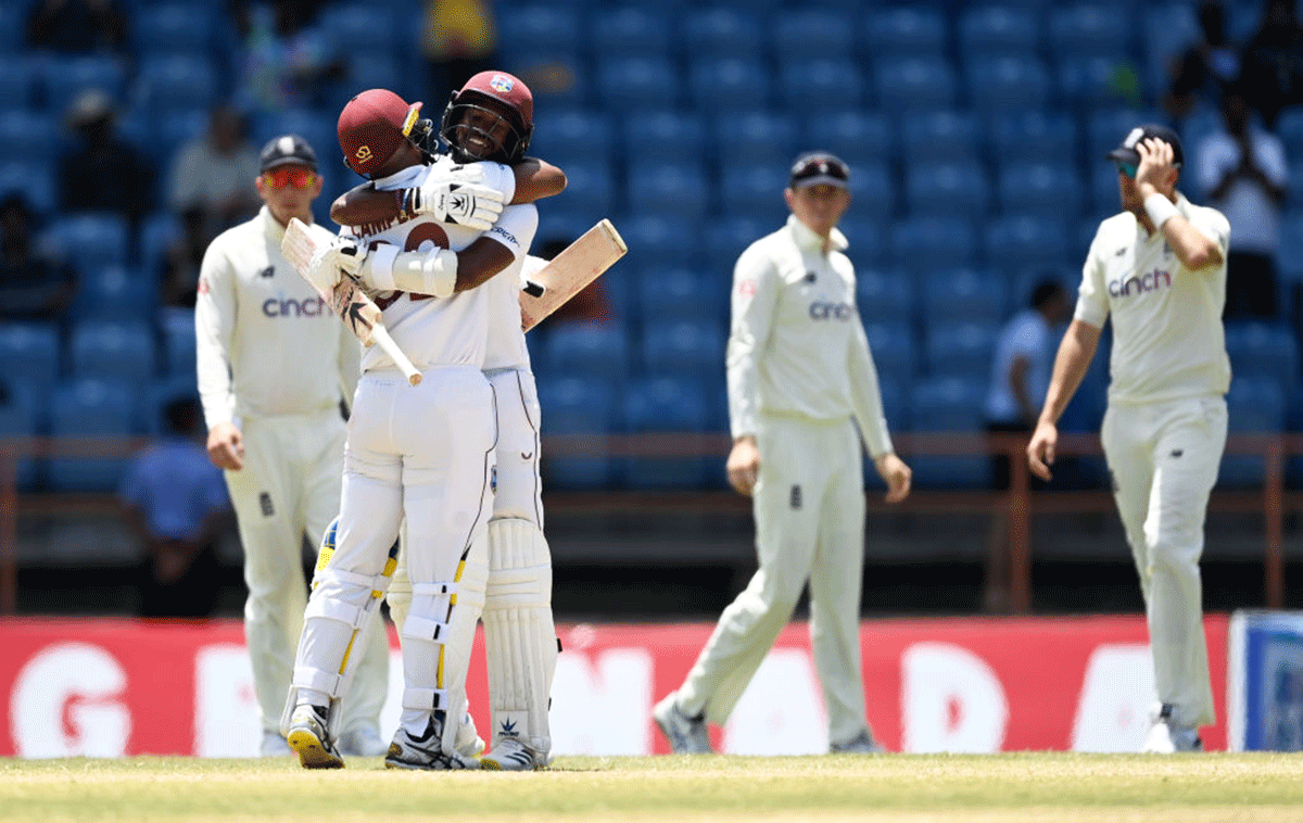 West Indies captain Kraigg Brathwaite celebrates with John Campbell after winning the 3rd Test match against England at National Cricket Stadium in Grenada on Sunday 