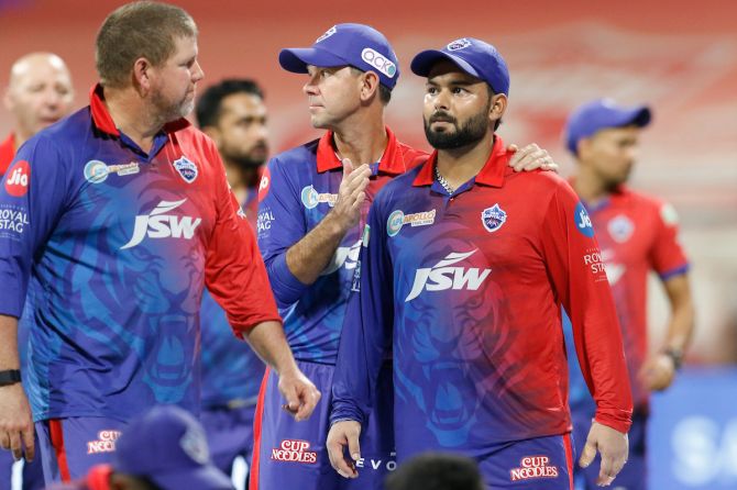 Coach Ricky Ponting commiserates with captain Rishabh Pant after Delhi Capitals' defeat to Mumbai Indians that put them out of the IPL play-off in Mumbai on Saturday.  