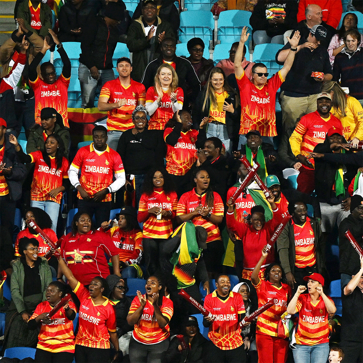 Ecstatic Zimbabwe fans at the stadium in Hobart on Friday