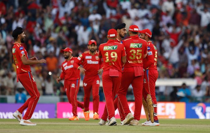 Punjab Kings players celebrate after Arshdeep Singh dismisses Kolkata Knight Riders's Anukul Roy during the IPL match at the I S Bindra Stadium, in Mohali, on April 1.