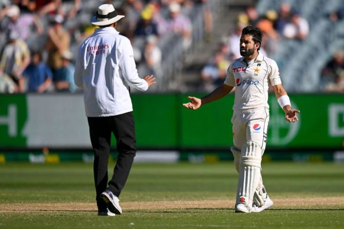 Pakistan's Mohammad Riizwan speaks to the umpire after his controversial dismissal through DRS. After Rizwan's dismissal Pakistan were felled in no time