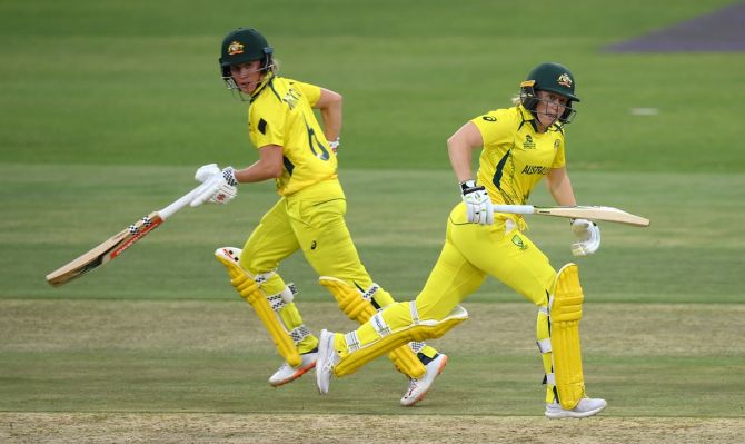 Australia's Beth Mooney and Alyssa Healy run between the wickets during their unbeaten 113-run opening stand in the ICC women's T20 World Cup Group A match against Sri Lanka, at St George's Park, in Gqeberha, South Africa, on Thursday.