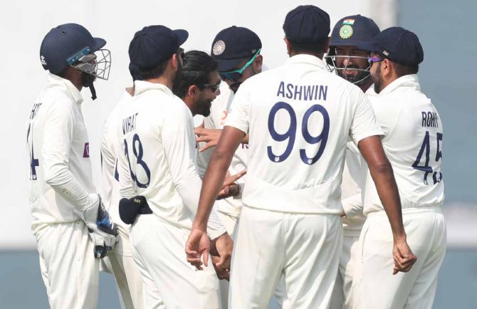 India's players rejoice after Ravindra Jadeja bags the key wicket of Australia opener Usman Khawaja on Day 1 of the second Test, at the Arun Jaitley stadium, in Delhi, on Friday.