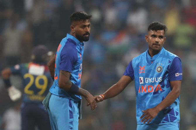 Shivam Mavi is congratulated by Hardik Pandya after finishing with figures of 4 for 22 on debut.