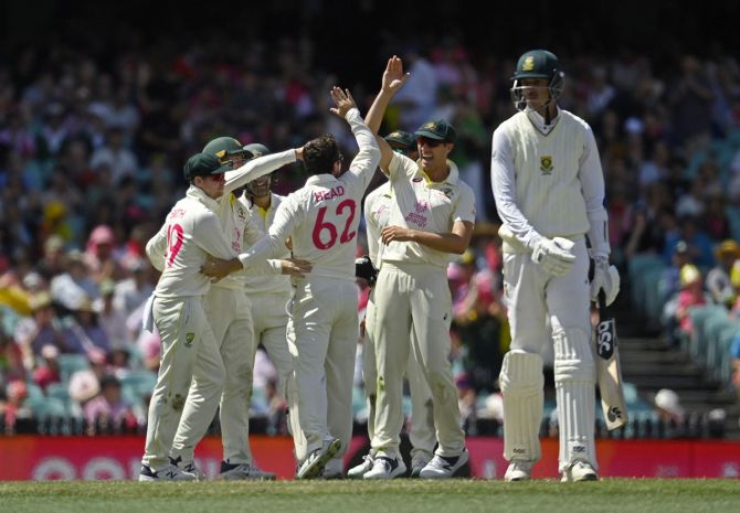 Australia's Travis Head celebrates with teammates after dismissing South Africa's Marco Jansen during Day 5 of the third Test at Sydney Cricket Ground on Sunday.