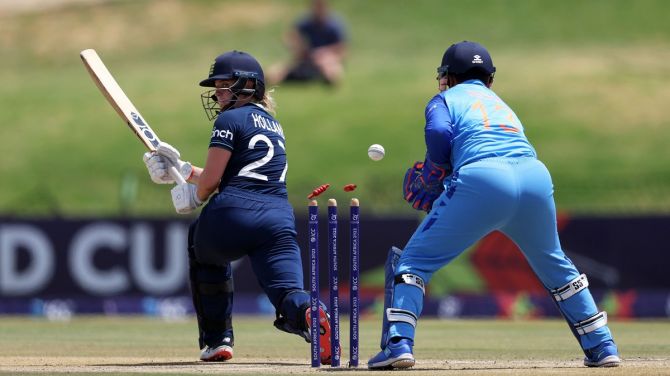Niamh Holland is bowled by Archana Devi.