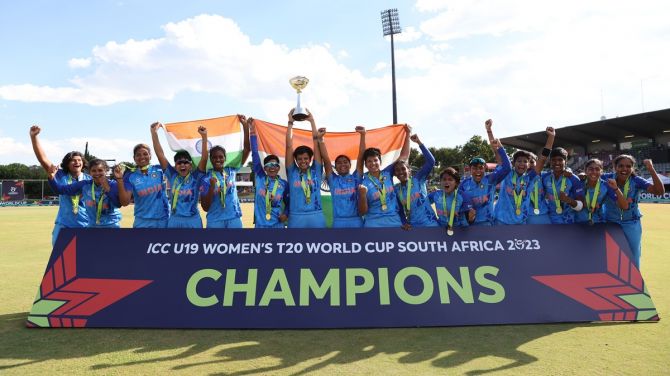 India's players celebrate with the ICC women's Under-19 T20 World Cup Trophy after defeating England in the final at JB Marks Oval in Potchefstroom, South Africa, on Sunday.