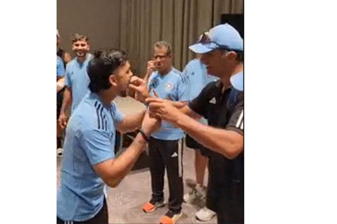 Ishan Kishan is fed cake during his birthday celebrations with the team