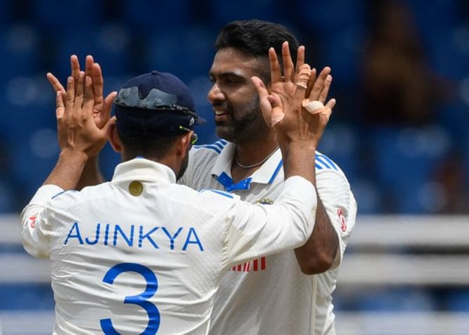Ravichandran Ashwin celebrates with Ajinkya Rahane after dismissing West Indies opener Kraigg Brathwaite in the second innings.