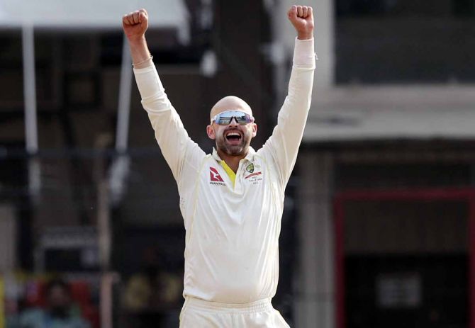 Nathan Lyon celebrates the wicket of Cheteshwar Pujara