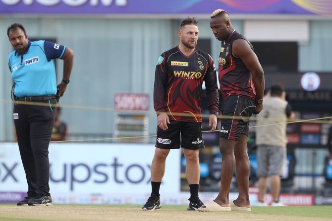 Brendon McCullum chats with Andre Russell at the DY Patil stadium in Mumbai during his stint as Kolkata Knight Riders coach in Indian Premier League season 2022.