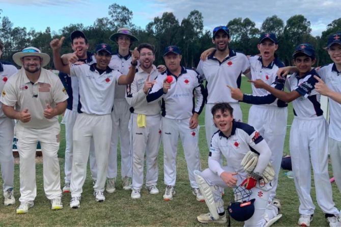 The Mudgeeraba Nerang & Districts Cricket Club and Gareth Morgan (ball in hand) celebrate their win. 