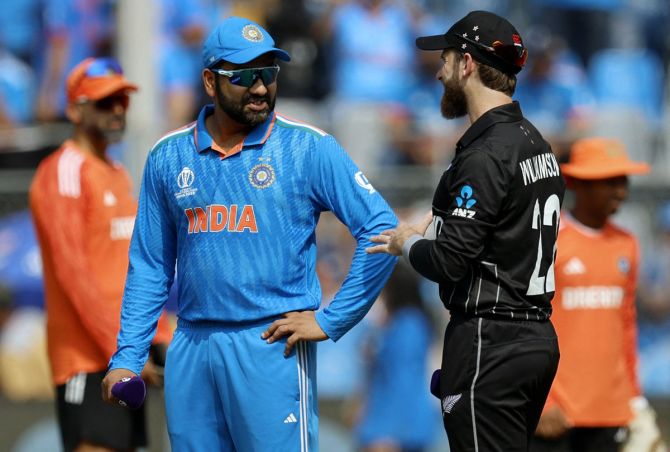 India skipper Rohit Sharma and New Zealand's Kane Williamson before the toss for the ICC World Cup semi-final at the Wankhede stadium in Mumbai on Wednesday.