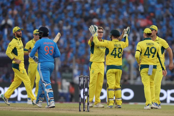 Australia's Adam Zampa celebrates after taking the lbw wicket of India's Jasprit Bumrah 