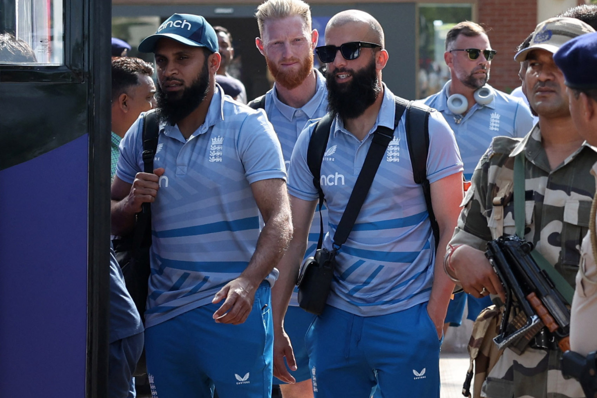 England's Adil Rashid, Moeen Ali and Ben Stokes arrive at Sardar Vallabhbhai Patel Airport in Ahmedabad on Tuesday. Eight members of their triumphant 2019 squad are back to help England try to become only the third team to defend the ODI World Cup title after West Indies and Australia