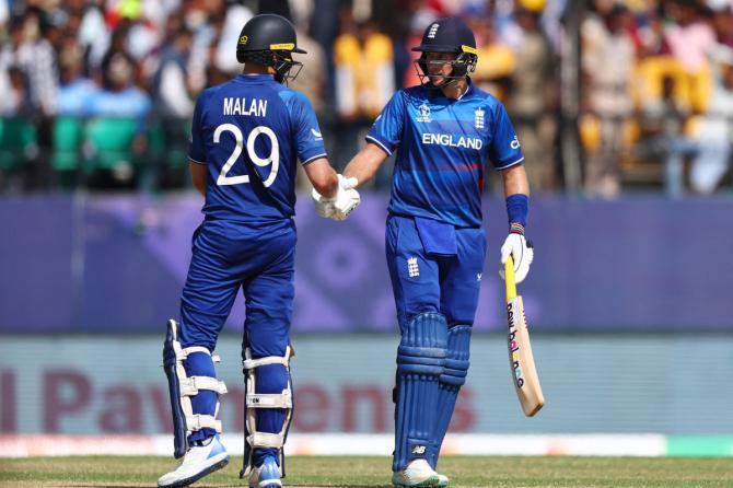 England's Joe Root celebrates with Dawid Malan after reaching his half century