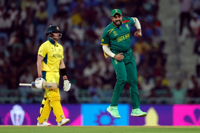 South Africa's Tabraiz Shamsi celebrates after Australia's Steven Smith was declared out LBW after SA took the review
