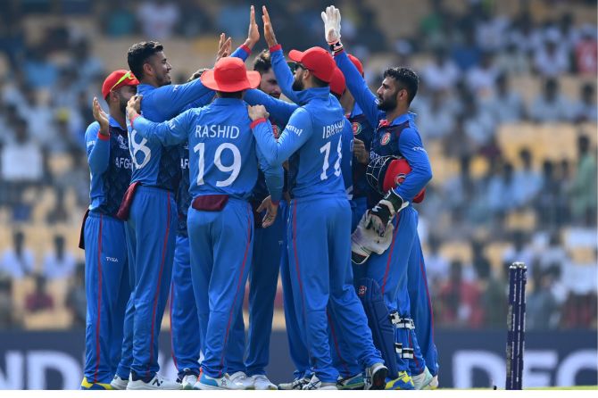 Afghanistan celebrate after Mujeeb Ur Rahman takes out Devon Conway