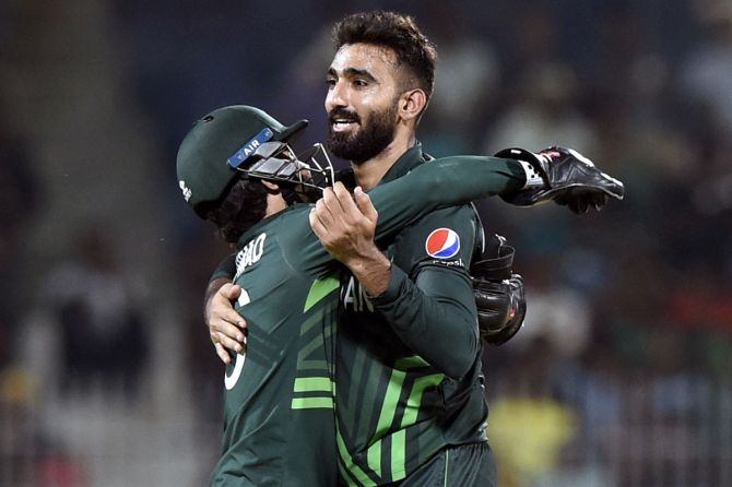 Usama Mir celebrates taking the wicket of Aiden Markram