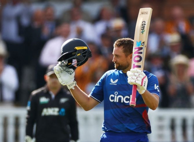 England's Dawid Malan celebrates scoring a century during the fourth One-Day International against New Zealand at Lord's Cricket Ground, London, on Friday.