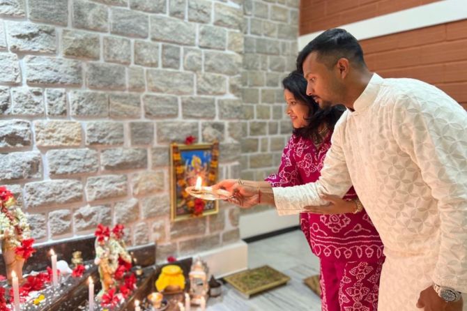Mayank Agarwal and his wife welcome Lord Ganesh to their home
