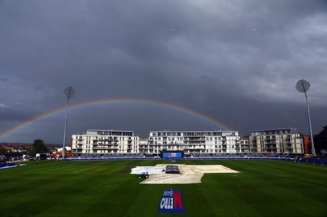 General view after the match was abandoned due to bad weather as a rainbow is pictured over the ground