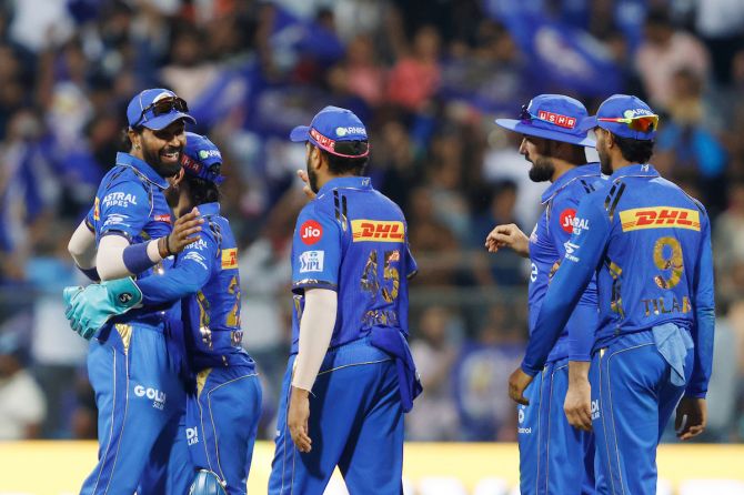 Mumbai Indians players after winning their match against Delhi Capitals at the Wankhede Stadium, Mumbai on Sunday