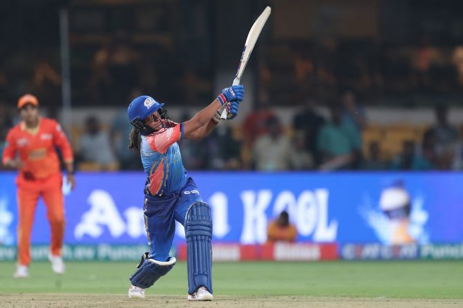 Mumbai Indians Women's Harmanpreet Singh sends one sailing over the stands